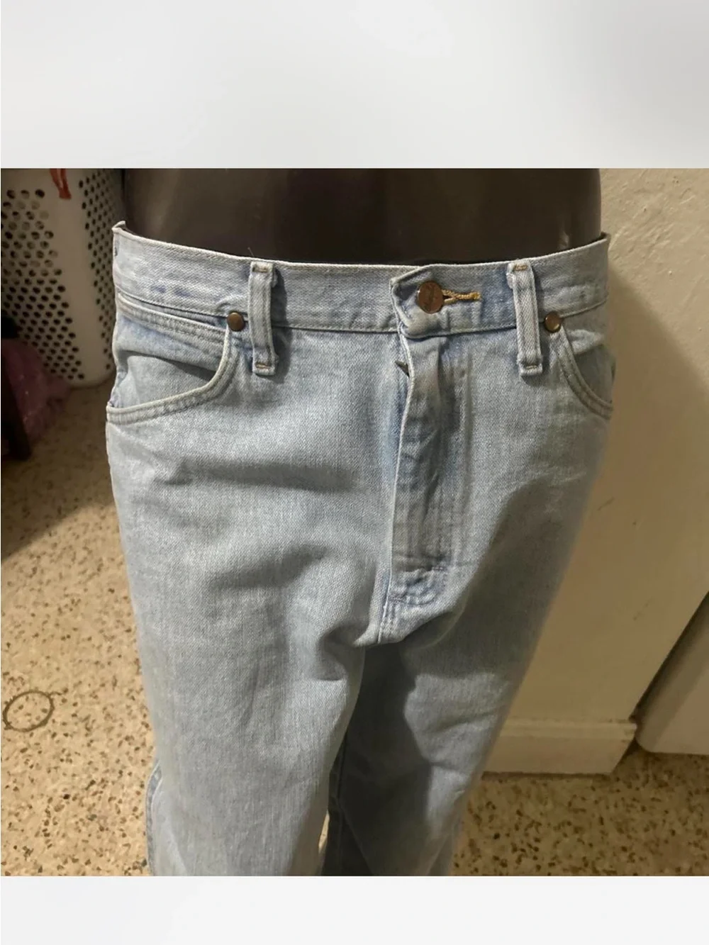 Wrangler denim visible